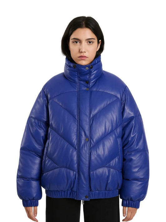 Person wearing a blue puffer jacket on a white background