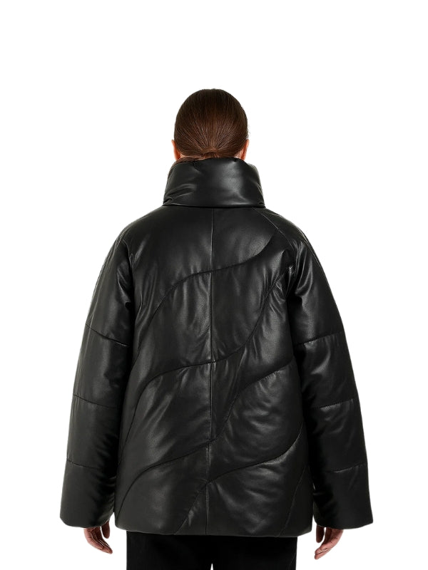 Person wearing a black leather coat on a white background