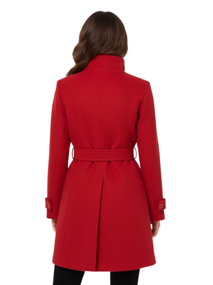 Red coat worn by a person on a white background